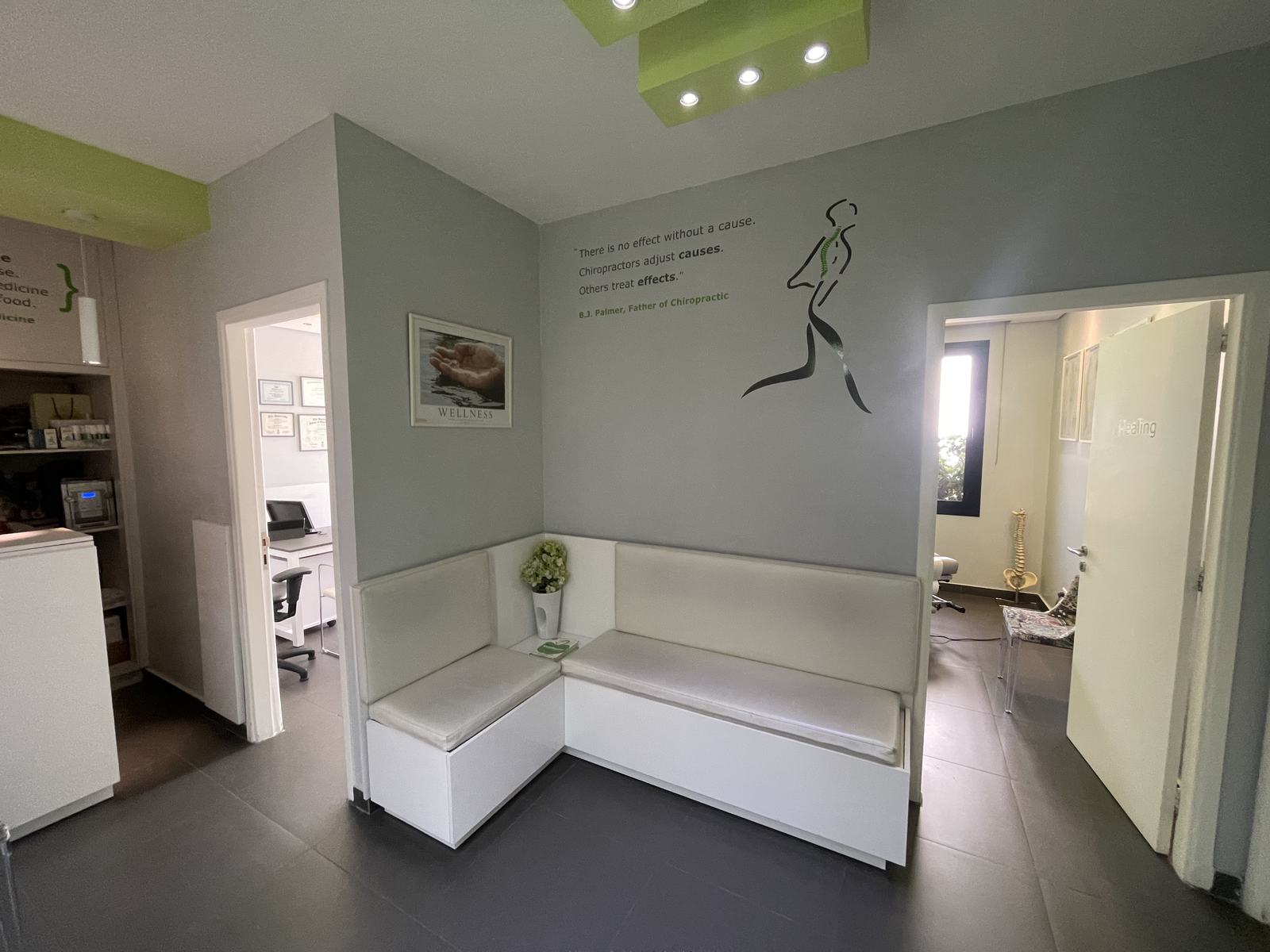The Gemmayzeh practice: reception, the waiting bench, the office and the door to the adjusting room