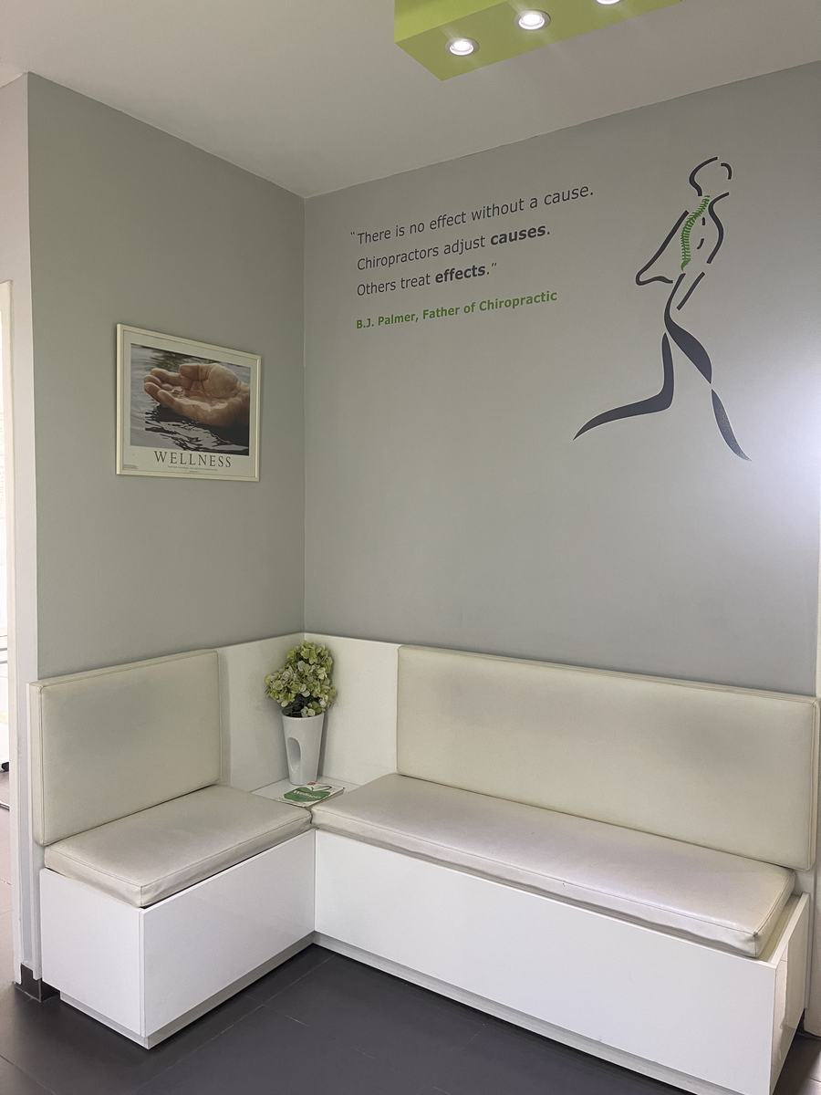 The Gemmayzeh waiting area, with bench seating and the practice mark on the wall